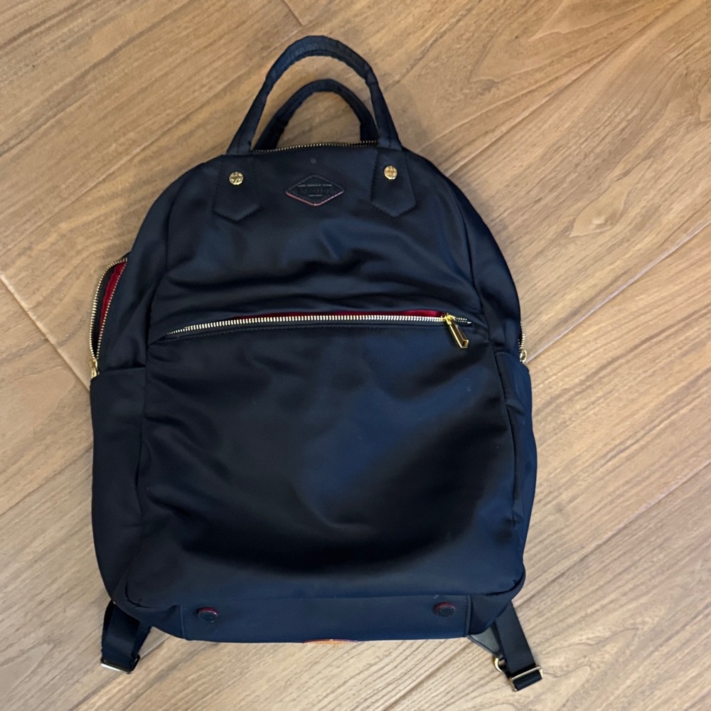 MZ Wallace Navy Backpack with Red and Gold Details